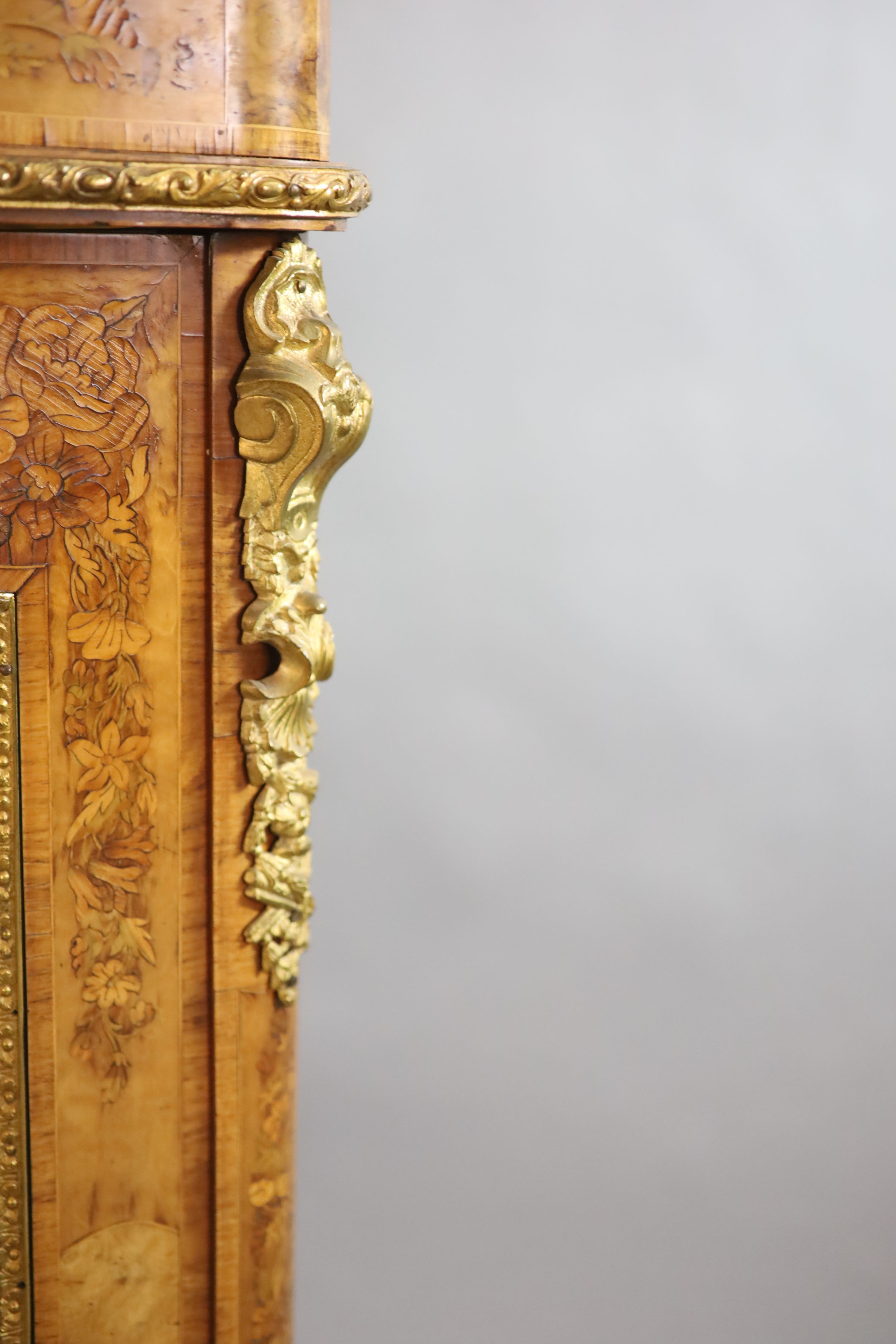 A Victorian ormolu mounted marquetry inlaid walnut bookcase, W.126cm D.38cm H.115cm